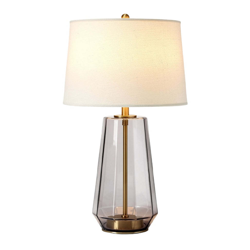 **Lampa stołowa z przezroczystym kloszem i złotym wykończeniem**